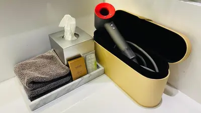 a box with a pair of scissors and a box of towels at HOLLYWOOD HILLS JETLINER VIEWS at STUDIO 1080 HOLLYWOOD in Los Angeles