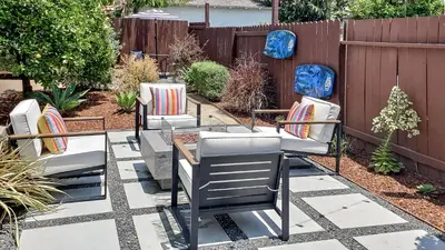 a patio with four chairs and a table at Top Location Walk to Dining, Shops & Near Beach CC E in Culver City