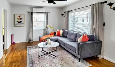 a living room with a couch and a table at Top Location Walk to Dining, Shops & Near Beach CC E in Culver City
