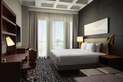 a hotel room with a bed and a desk at Hyatt Place LAX/Century BLVD in Los Angeles