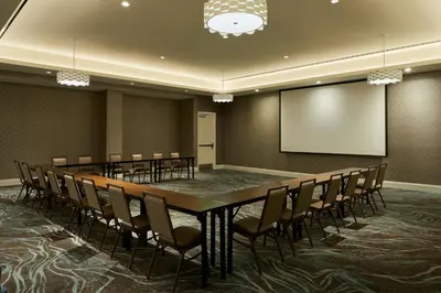 a conference room with a large table and chairs at Residence Inn by Marriott Marina del Rey in Los Angeles