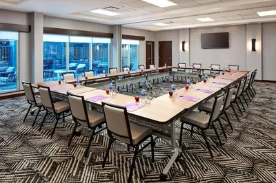 a large conference room with a long table and chairs at Hyatt Place Los Angeles / LAX / El Segundo in El Segundo