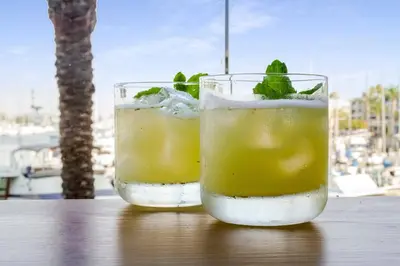 two glasses of drinks sitting on a table at Courtyard by Marriott Marina del Rey in Los Angeles