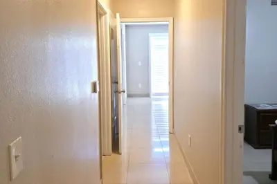 a hallway with a door leading into a room at Los Angeles Retreat Close to Hotspots in Los Angeles