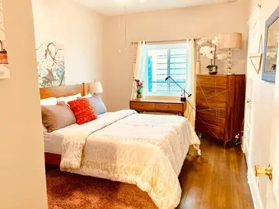 a bedroom with a bed and a window at Private 1BR Apt LA Home Sweet Home in KTown\u5bb6 in Los Angeles