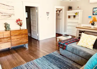 a living room with a couch and a table at Private 1BR Apt LA Home Sweet Home in KTown\u5bb6 in Los Angeles