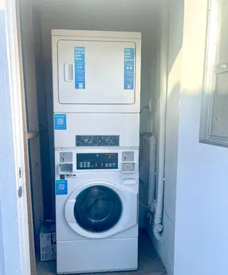 a washer and dryer in a small room at Private 1BR Apt LA Home Sweet Home in KTown\u5bb6 in Los Angeles