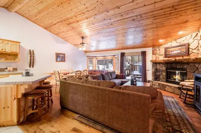a living room with a couch and a fireplace at Little Cubs Cabin #1986 by Big Bear Vacations in Big Bear Lake