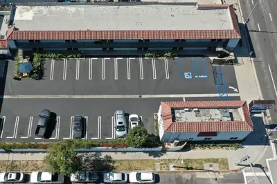 an overhead view of a parking lot with cars at Unik Motel in Harbor City