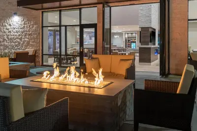a fire pit in the lobby of a restaurant at Residence Inn by Marriott Lancaster Palmdale in Lancaster