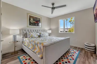 a bedroom with a large bed and a window at 4 SantaMonica De Lux in Los Angeles