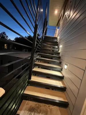 a set of stairs leading up to a house at Modern Bright New Studio with Roof-top Deck Walk to Santa Monica Beach, FreeWiFi, Parking in Santa Monica