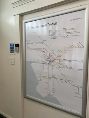 a framed map of the los angeles rapid transit at The Wilshire Metro in Los Angeles