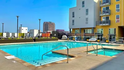 a large swimming pool on top of a building at Apart Hotel at Chinatown in Los Angeles