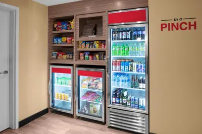 a store with two refrigerators in front of a refrigerator at TownePlace Suites By Marriott Tehachapi in Tehachapi