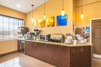 a kitchen with a counter top with some appliances at Comfort Inn & Suites Mojave in Mojave