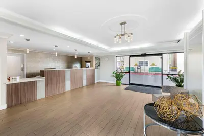 a living room with a kitchen and a dining room at Best Western Plus Ontario Airport & Convention Center in Ontario