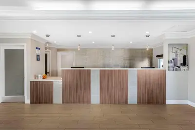 a kitchen with a bar in a room at Best Western Plus Ontario Airport & Convention Center in Ontario