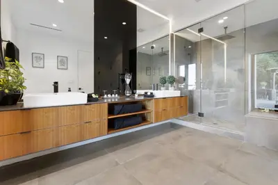a bathroom with a tub and a sink and a shower at Franklin Modern in Los Angeles