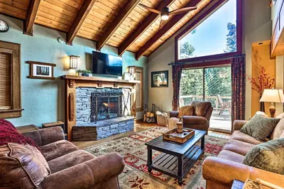 a living room with couches and a fireplace at Tranquil Twin Peaks Retreat Hike, Ski and Swim in Twin Peaks