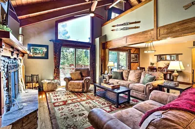 a living room with couches and a fireplace at Tranquil Twin Peaks Retreat Hike, Ski and Swim in Twin Peaks