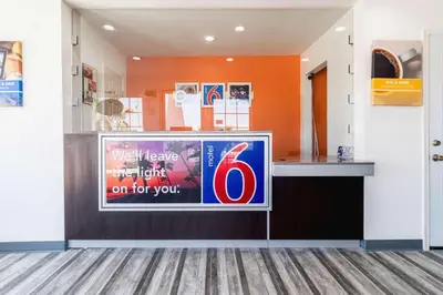 a store front with a sign on the wall at Motel 6-Barstow, CA - Route 66 in Barstow