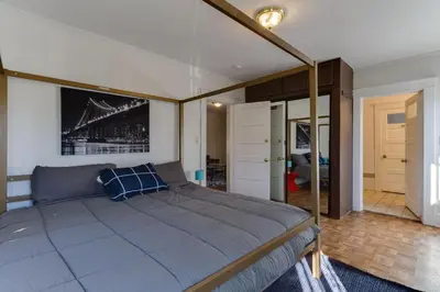 a bedroom with a large bed in a room at Los Angeles 3 Bedroom Charmer Large Guest House in Los Angeles
