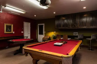 a living room with a pool table in it at Villa Sausalito - Newly Designed 4BR HOUSE & POOL by Topanga in Los Angeles