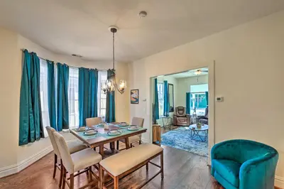 a dining room with a table and chairs at Riverside House with Yard about 1 Mi to Downtown! in Riverside