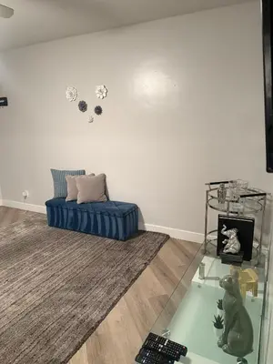 a living room with a couch and a glass table at Hollywood Prime Location Walk to Hollywood Attractions Free Parking in Los Angeles