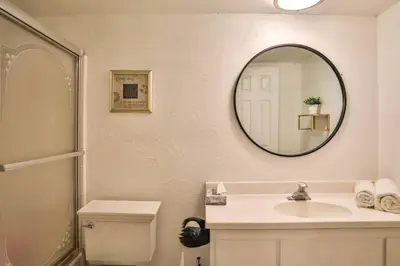 a bathroom with a sink and a mirror at Lake house Cabin - Lake Arrowhead in Lake Arrowhead