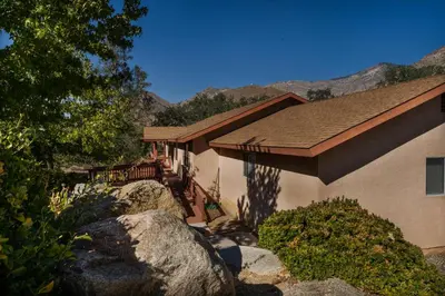a house with a porch and a roof at Lazy Squirrel - Cozy Family House with Full Game Room in Kernville