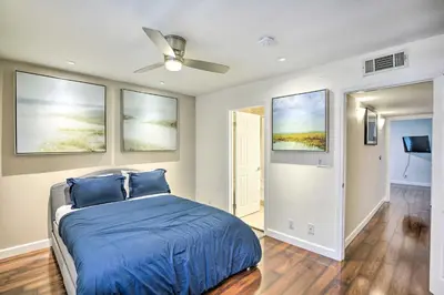 a bedroom with a bed and a ceiling fan at 2 Mi to Griffith Park! Burbank Extended-Stay Condo in Burbank