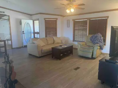 a living room with a couch and a table at Views Views Views! in Wofford Heights