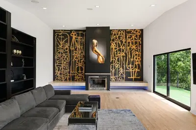 a living room with a couch and a fireplace at The Hollywood Hills Crest Villa in Los Angeles