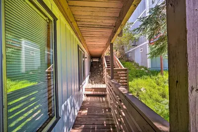 a porch of a house with a wooden roof at Running Springs Cabin with Large Deck and View! in Running Springs