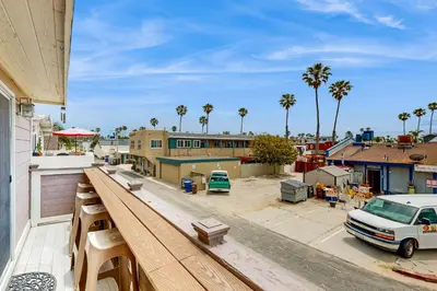 an apartment balcony with a view of a parking lot at Sailaway Cabin B in Ventura