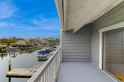 a balcony with a view of a marina at Gateshead Haven in Oxnard