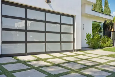 a garage door in a house at Curson Modern in Los Angeles
