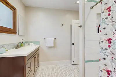 a bathroom with a sink and a shower at Cedar Oasis in Ventura