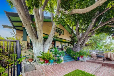 a house with trees and plants in front of it at Highland Park Haven in Los Angeles