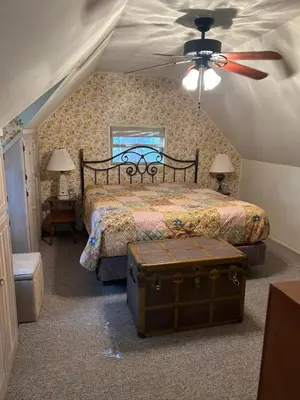 a bedroom with a bed and a ceiling fan at Sequoia National Forest Cabin-ATV Ride in Panorama Heights