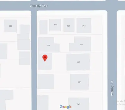 a screenshot of a cell phone with a red dot at Nearby Beach House in El Segundo