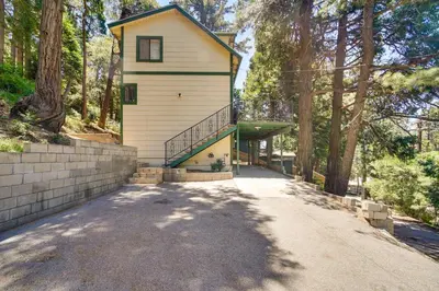 a house with a staircase on the side of it at Cozy Crestline Getaway about 2 Mi to Lake Gregory in Crestline