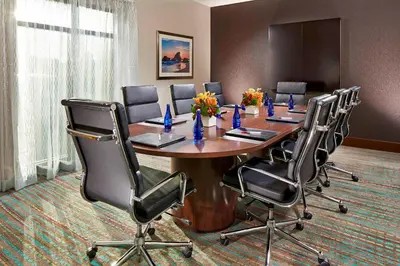 a conference room with a large table and chairs at Residence Inn by Marriott Los Angeles Redondo Beach in Redondo Beach