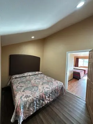 a bedroom with a bed in a room at Stardust inn in Azusa