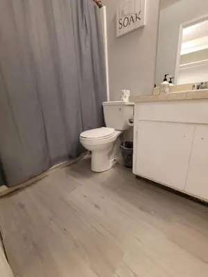 a bathroom with a toilet and a sink at (A13) Cozy 1 Bedroom Studio with Private Bath in Los Angeles