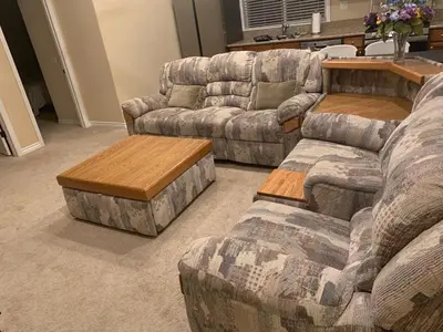 a living room with couches and a coffee table at LuxHome Suites in Mansion in Riverside