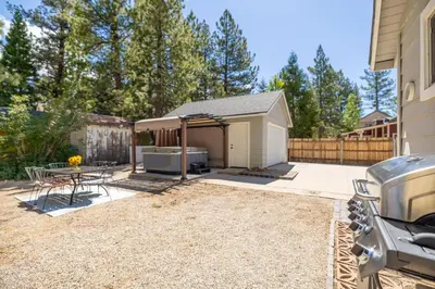 a backyard with a picnic table and a gazebo at Bayview Bungalow - Cabin with Hot Tub One Block from Big Bear Lake! in Big Bear Lake