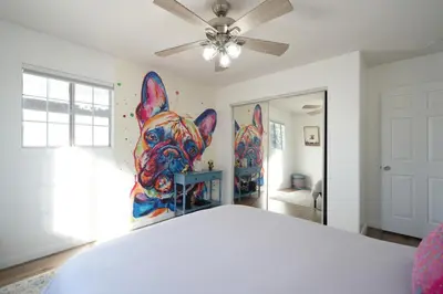 a room with a painting of a dog on the wall at The Avalon - 35 Percent Off March! in Los Angeles